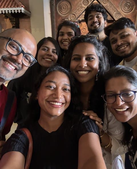 A close-up group selfie of teammates on an outing